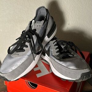 Nike running shoes. Pre-owned in good condition.